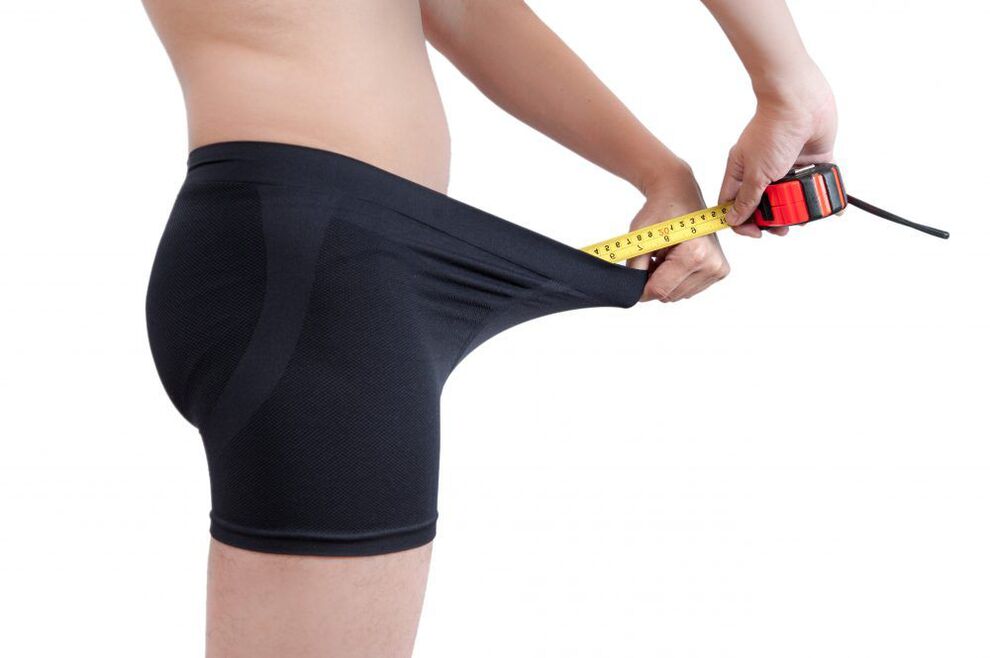 Measuring the length of the penis after a soda massage